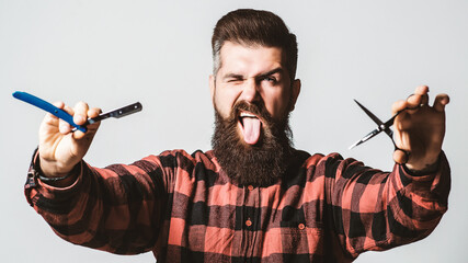 Bearded guy showing tongue. Barber shop, service. Mens haircut. Barber scissors. Vintage straight razor. Barbershop advertising.