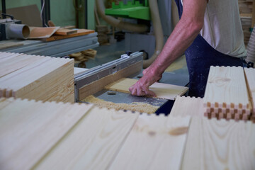 stacked wooden boards in a woodworking industry. stacks with pine lumber. folded edged board. wood harvesting shop. timber for construction