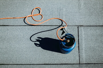 Details of waterproofing at house construction. Propane gas blowtoch details