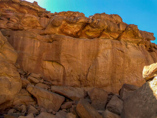 A view of coloured rock strata on thew walls of the Coloured Canyon near Nuweiba, Egypt in summer