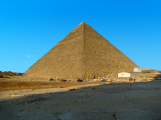 Fototapeta na wymiar The Great Pyramid at Giza, Egypt illuminated by the late afternoon sun in the summertime