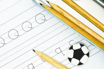 school preparation (notebook, pencil and eraser)