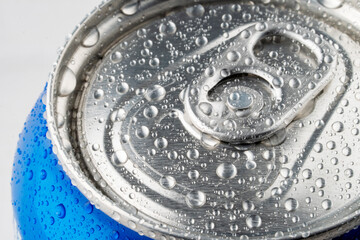 Closeup of soda or pop can with drops of water for fresshness