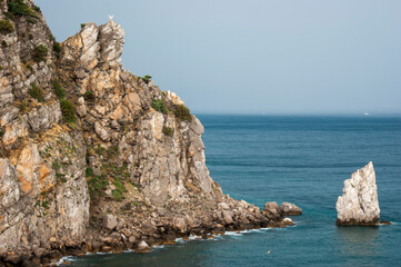 Rock "Sail" in the Crimea. View of the bay from the height of the cliff. Summer vacation concept.