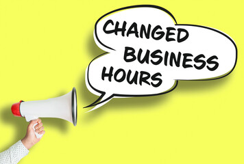 CHANGED BUSINESS HOURS poster or sign with megaphone and speech bubble against yellow background