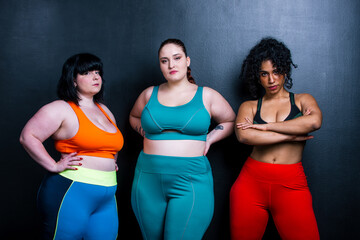 Plus size women making sport and fitness.