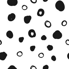 Hand drawn circles seamless pattern. Random dots loop texture background.