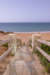Fototapeta premium access with stairs to a beach in Conil de la Frontera in Cadiz. Spain