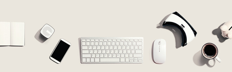 Computer keyboard with digital devices - flat lay