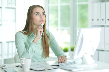 Portrait of a businesswoman working in office