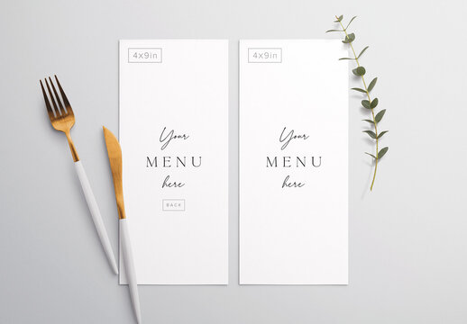 Menu on Table with Cutlery and Eucalyptus Mockup