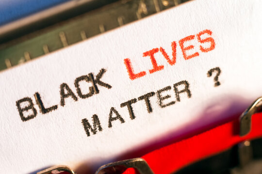 "Black lives matter?" typed on typewriter on black and red. BLM is a decentralized movement advocating for non-violent civil disobedience in protest against incidents of police brutality
