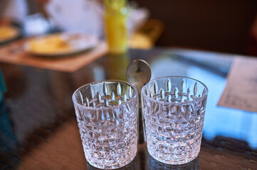 two transparent empty glasses on the table