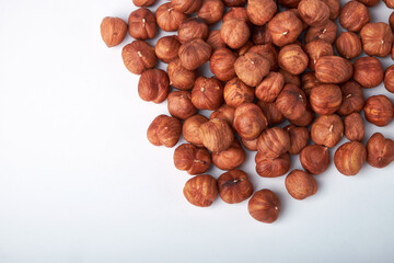 hazelnuts in a Cup on a white background