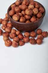 hazelnuts in a Cup on a white background