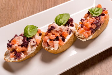 Bruschetta with feta, tomatoes, Kalamata olives dried rye baguette