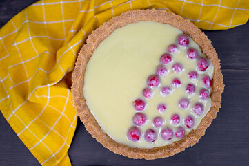 White Chocolate Raspberry Tart. A slice of tart on a plate. Summer dessert.