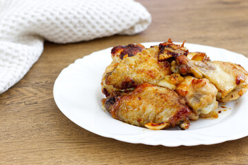 Grilled chicken wings with sweet honey sauce.