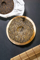 pressed puer tea top view. Chinese puer shu and shen in the form of pancakes. top view, vertical photo