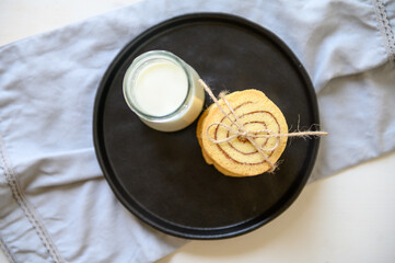Shortbread cookies with cinnamon and a glass of milk. Selective focus.