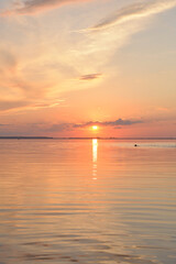 Fototapeta na wymiar Sunset on the lake in summer time