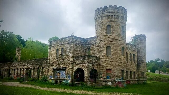 Kansas City Workhouse historical site also referred to as The Trap Castle with ominous storm clouds blowing  