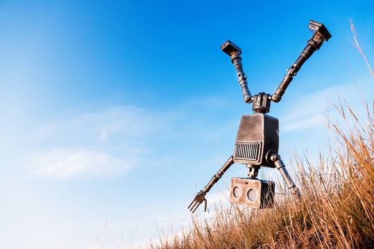 Robot on a background of blue sky