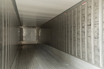 empty interior shipping cargo container for transportation shipping and logistic with copy space at...