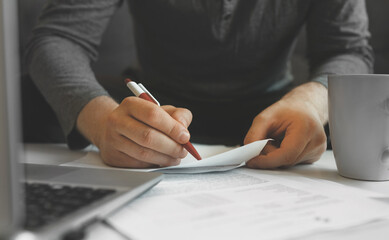 Businessman working with papers. Signing the contract.