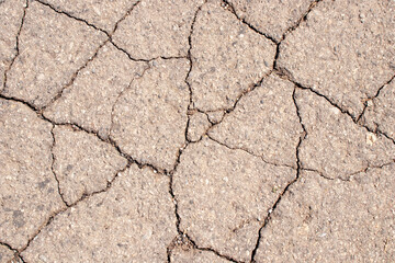 Cracked asphalt texture. Abstract asphalt background