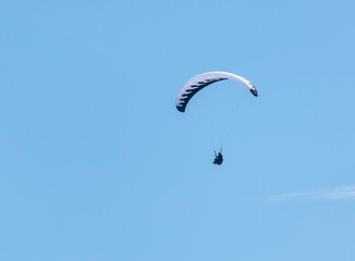 Paraglider against sky