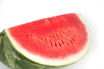 a huge piece of ripe watermelon without seeds. Clean. close-up. selective focus. Delicious fresh summer fruit concept.