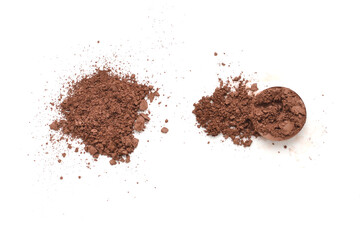 Makeup cosmetics. Eyeshadow in brown color crushed palette, colorful eye shadow powder on white background