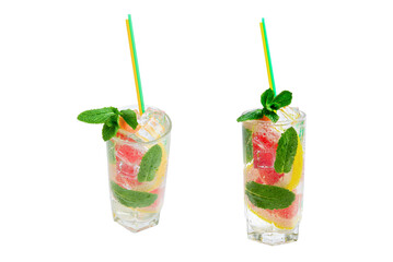 Summer detox drink with fresh fruits in glass jar.