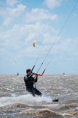Fototapeta premium Kite surfing on the north sea. Germany. 