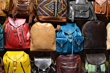 Leather backpacks on the exhibition in Fez, Morocco.