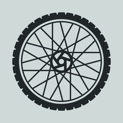 Obraz premium black bicycle wheel vector icon on grey background