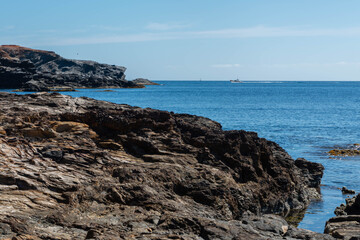 Rocky shore of the Mediterranean Sea in Spain on a beautiful sunny day