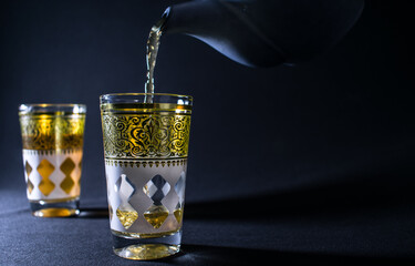Two glasses of Arabian tea in the shadows
