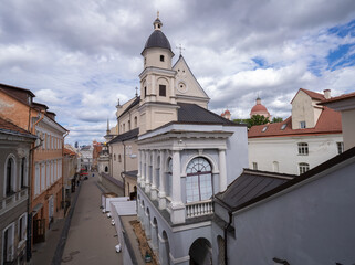 Obraz premium The Gate of Dawn or Sharp Gate, an old city gate in Vilnius, Lithuania. One of the most important religious, historical and cultural monuments and a major site of Catholic pilgrimage the country.