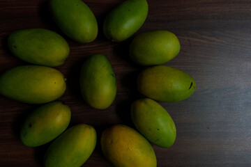fruit cut by knife, the fruits with knife on plate.