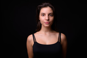 Portrait of young beautiful woman with short hair