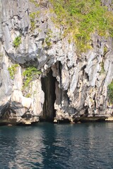 Very beautiful landscape with rocks, enter cave,  in the lagoon of El Nido, palawan, Philippines Islands.