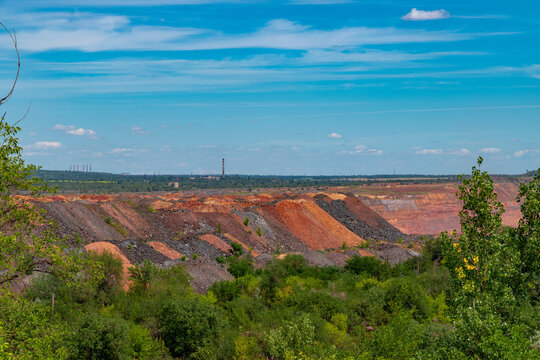 Ukraine, Krivoy Rog, unique place called "Ukrainian Mars". Waste rocks create multicolored mosaic. Open mine site with rare earth materials.