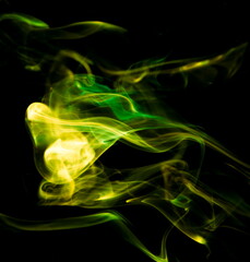 Colored smoke on black background