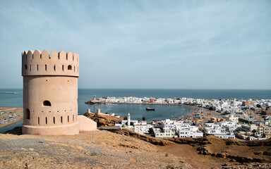 Picture of a small tower on the top of a hill overlooking Al Ayjah, in Oman.