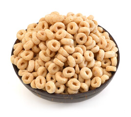 healthy cereal rings in wooden bowl on white