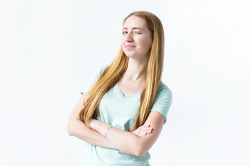 Portrait of a girl who smiles and winks an eye on a white background