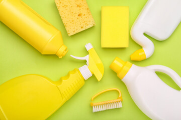 Set of cleaning supplies on color background