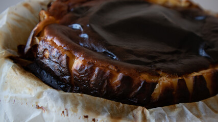 Basque burnt cheesecake freshly baked. Tasty San Sebastian cheesecake ready to serve and eat.